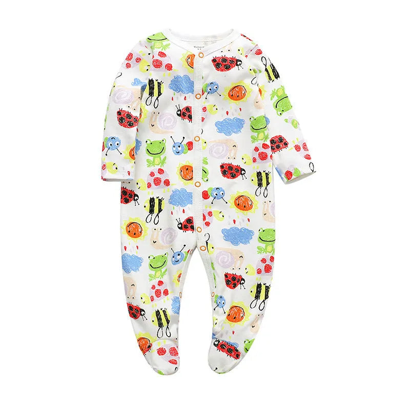 Soft cotton baby one-piece bodysuit in blue and green dinosaur print, size 6M, front view on white background