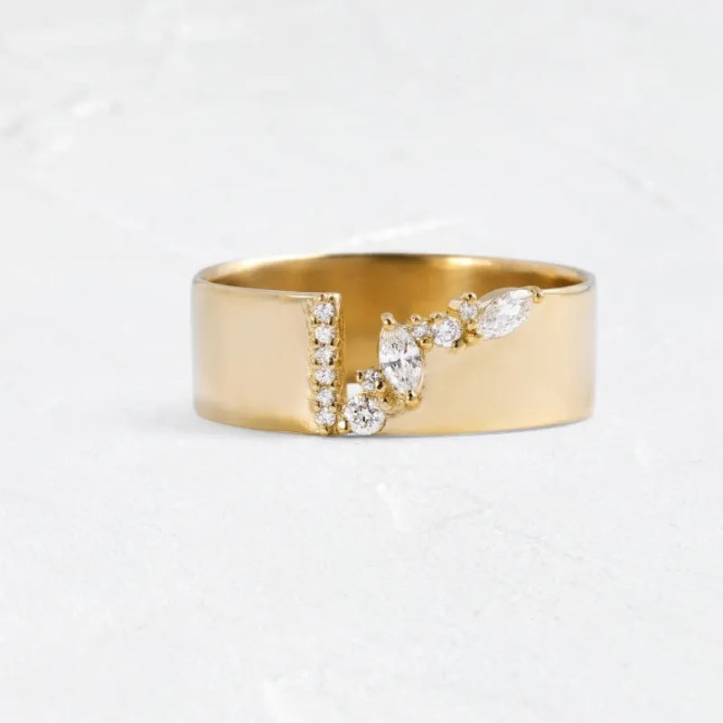 Gold-coloured women's ring with shining zircon stones on a copper band.