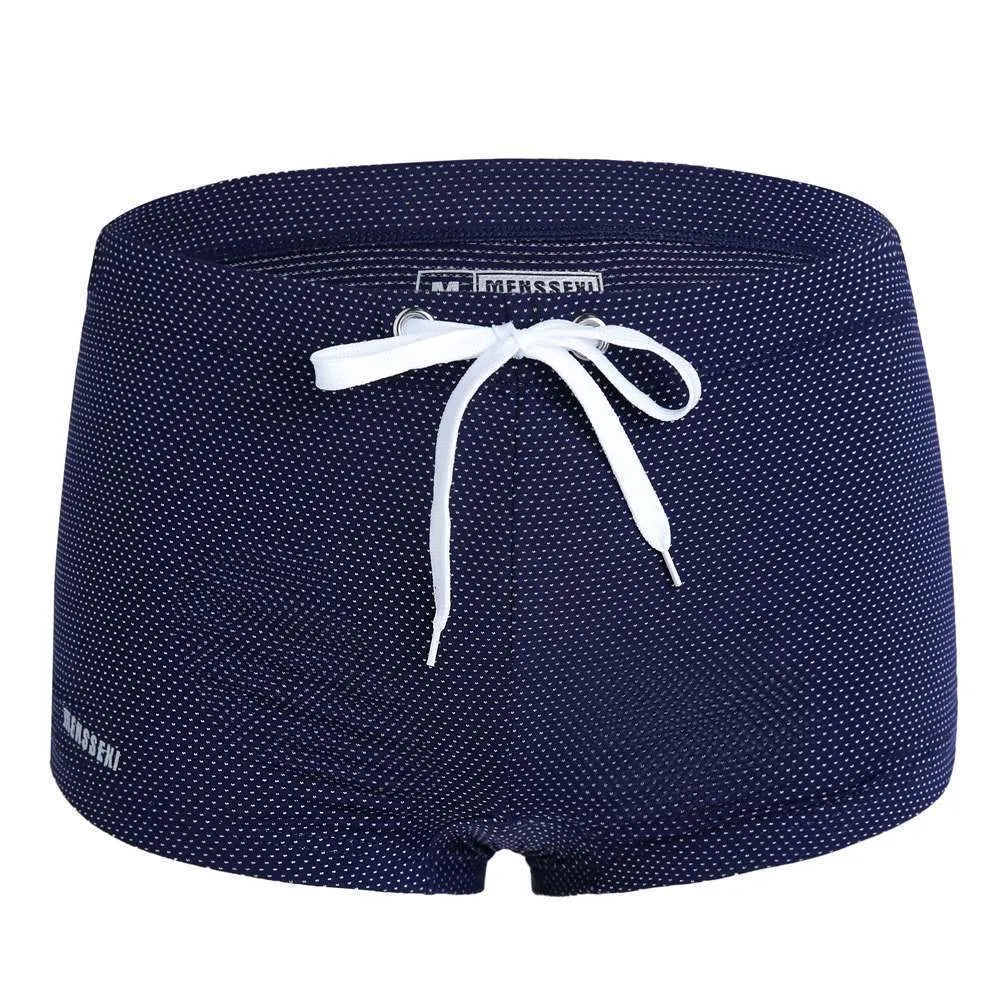 Men's low waist lace nylon boxer swimming trunks in multiple colours on a white background