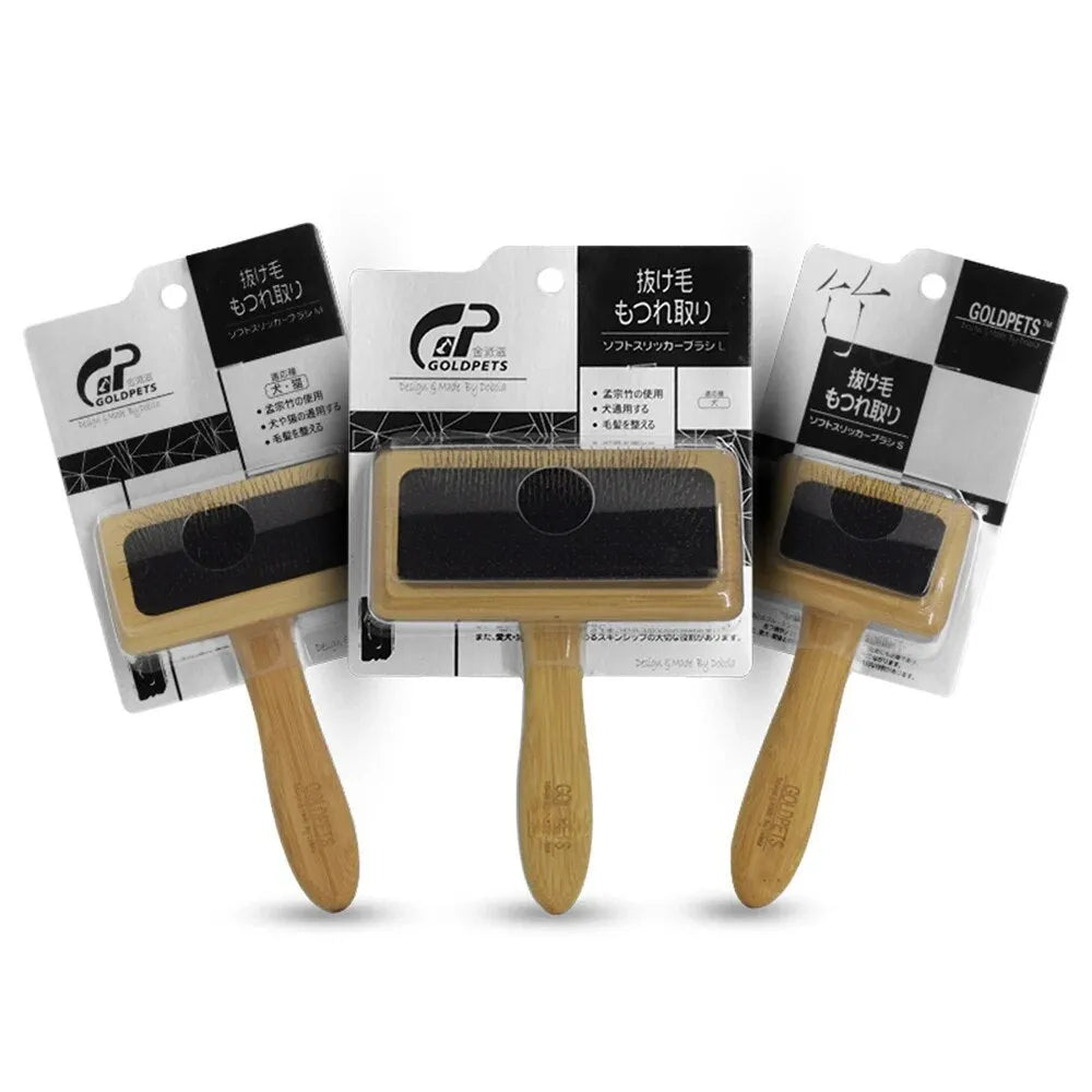 Goldpets bamboo slicker brush with wooden handle and 304 stainless steel pins on a light background