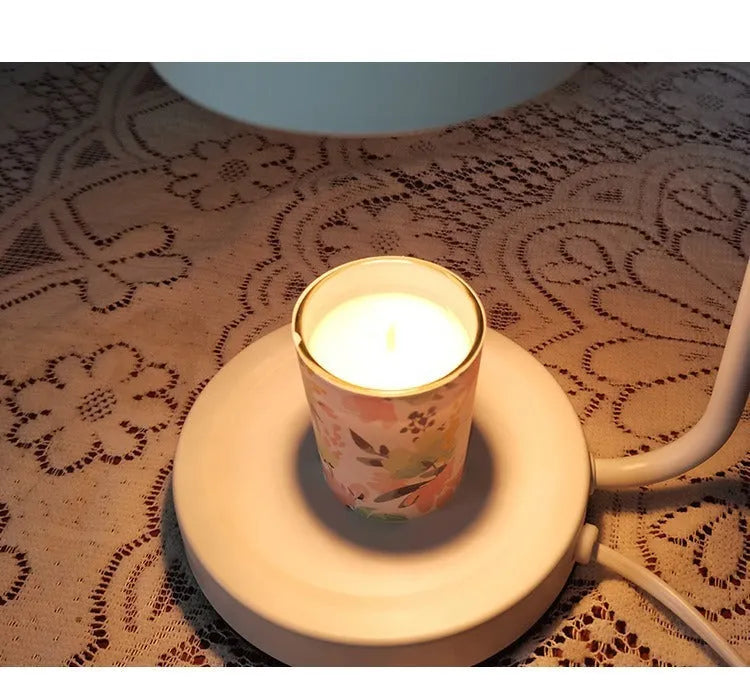 White European-style aromatherapy wax lamp with a dimmer switch on a steel holder.