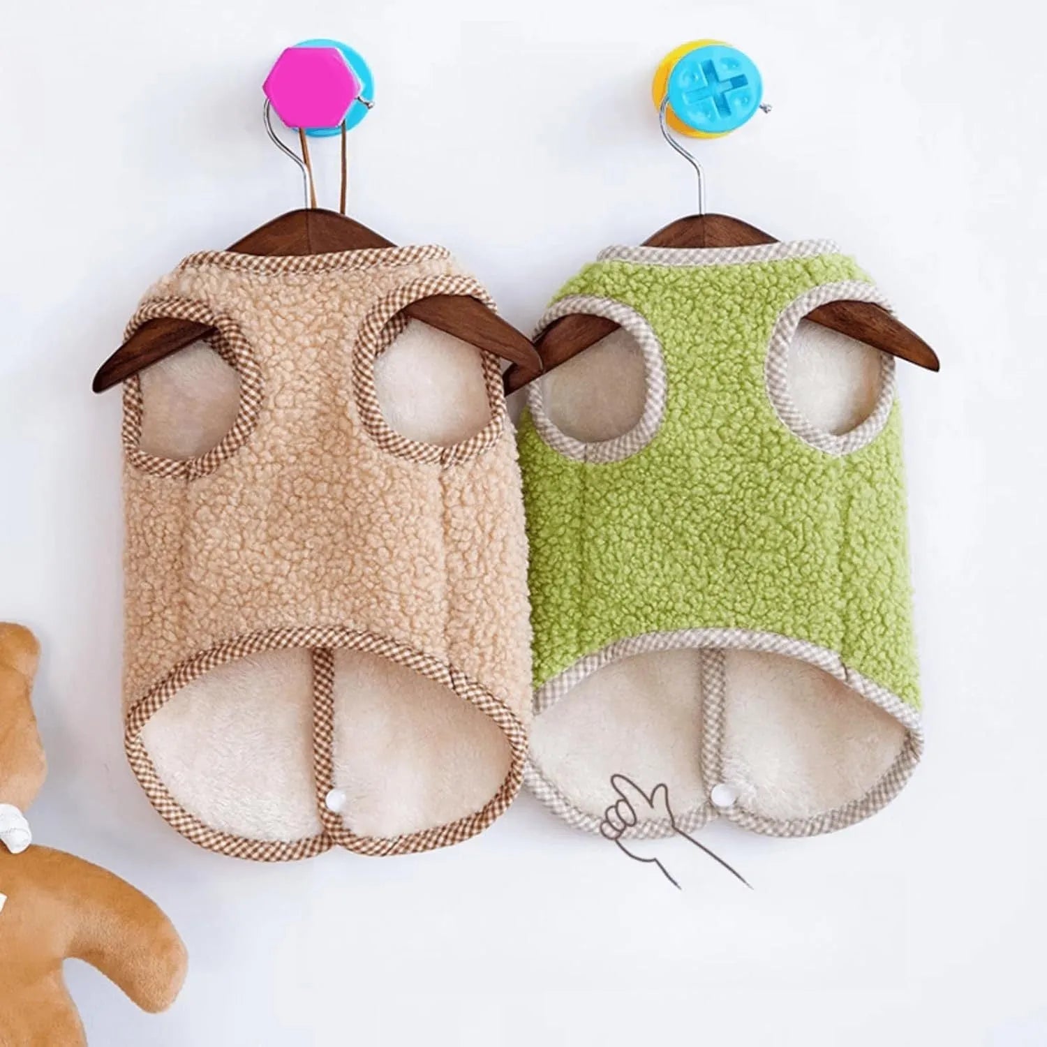 Green thickened coral fleece dog vest with a metal leash ring on a small dog.