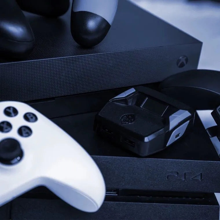 Black plastic wired to wireless controller converter adapter for gaming consoles.