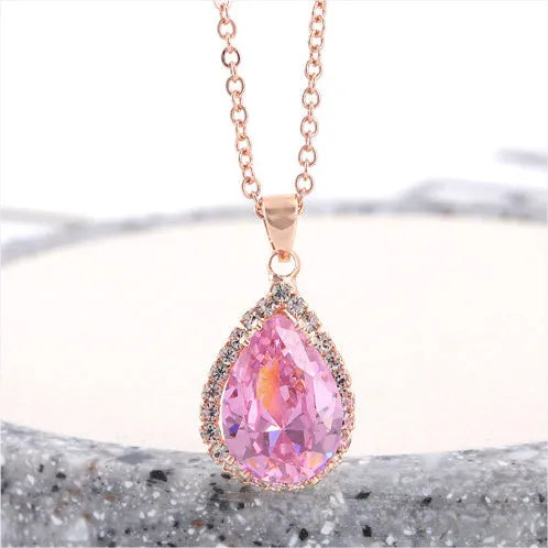 Women's drop-shaped rhinestone necklace in rose gold colour with geometric elements