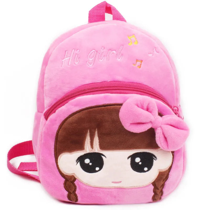 Small pink cartoon backpack for a baby or toddler aged 1 to 2 years, compact everyday bag.