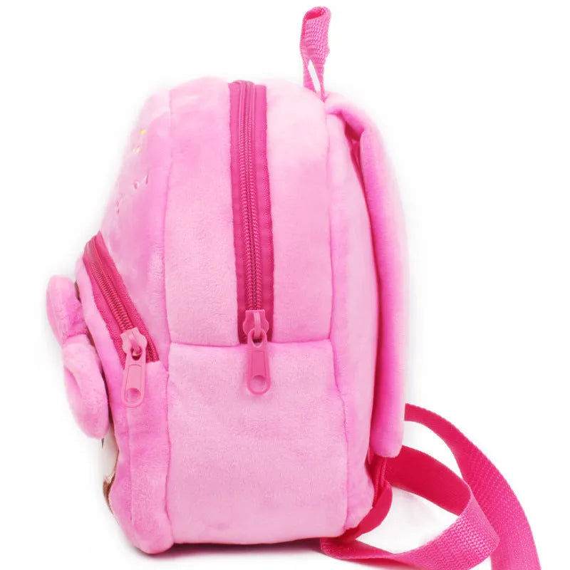 Small pink cartoon backpack for a baby or toddler aged 1 to 2 years, compact everyday bag.