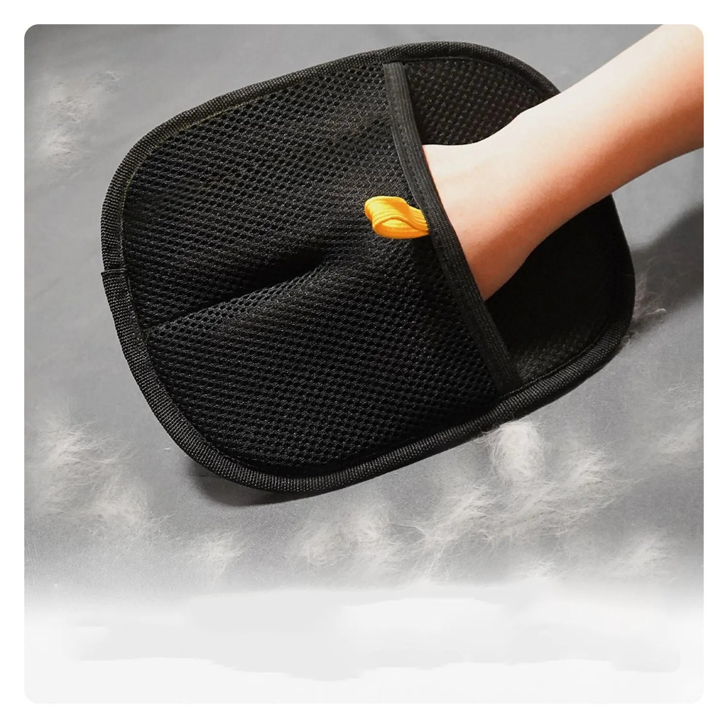 Pet electrostatic hair removal gloves with two-way bristles on a light background