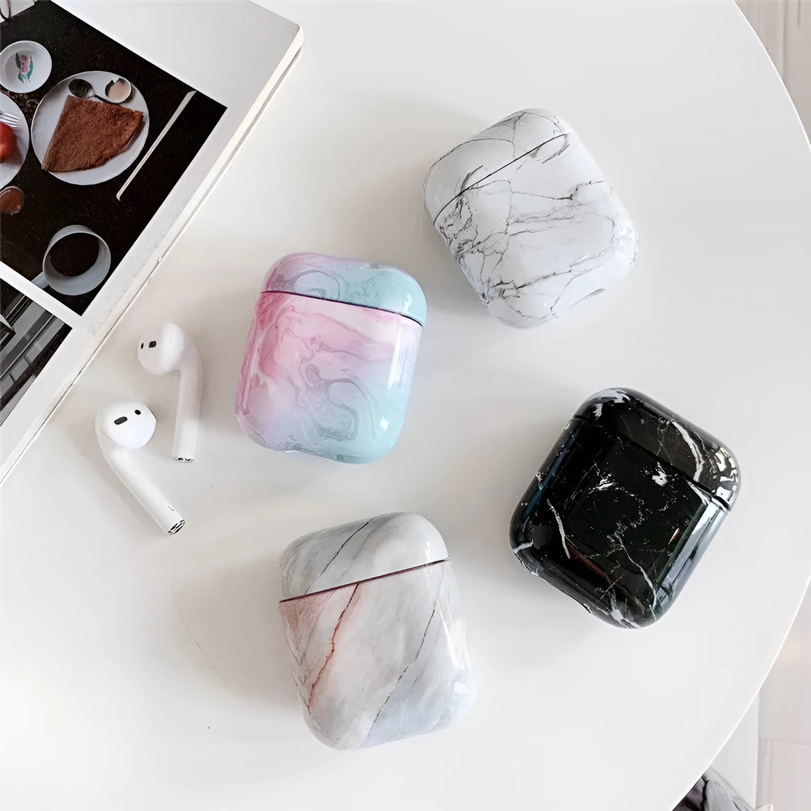 White marble-pattern hard PC protective case for Apple AirPods 1 and 2 charging box.