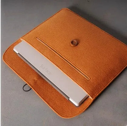 Gray felt laptop bag compatible with MacBook and tablet computers, open and ready