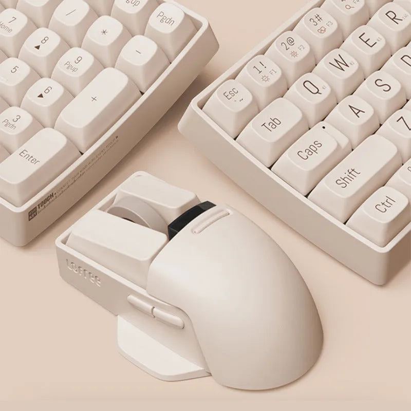 Xiaoqiao Tofu coloured three-mode wireless mouse with ergonomic shape on a desk.