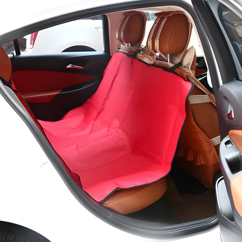 A square, padded car seat protector for pets in blue, showing its size on a vehicle seat.