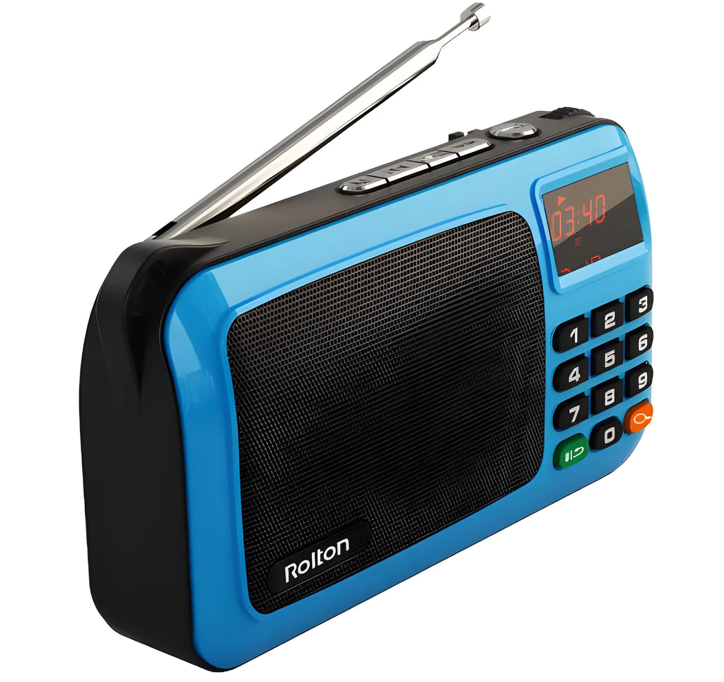 Golden Rolton W405 portable FM radio and MP3 speaker with LED display on a textured surface.