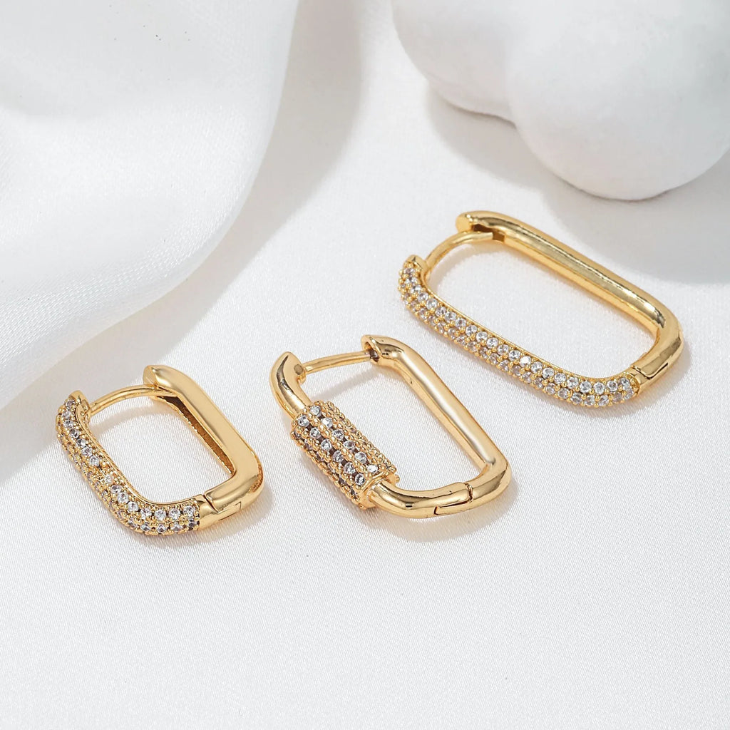 Three geometric square ear clips with micro inlaid zircon in gold and white K colours