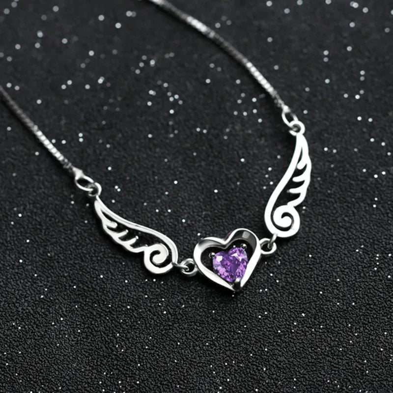 Angel wings necklace in 925 sterling silver with purple crystal heart pendant and 45cm link chain