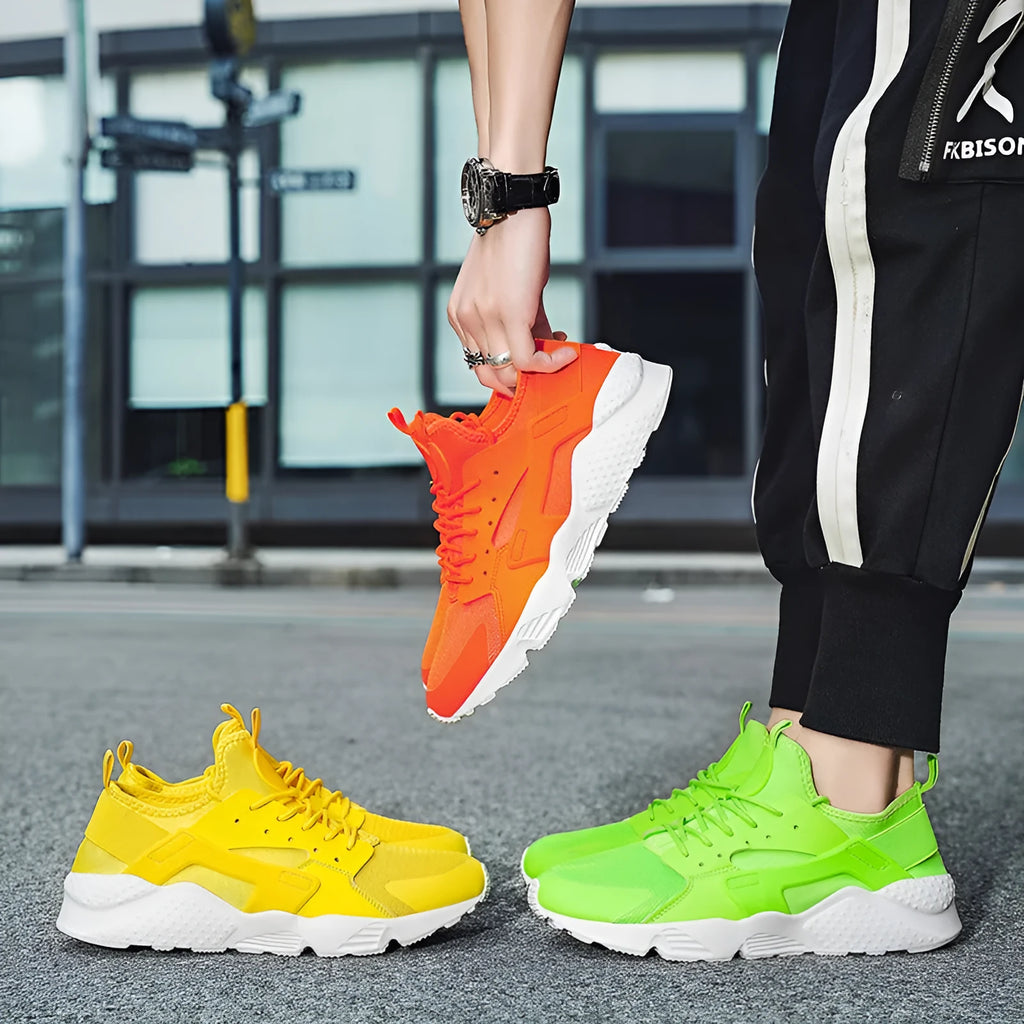 Men's low top mesh sneakers in fluorescent colours on a flat sole