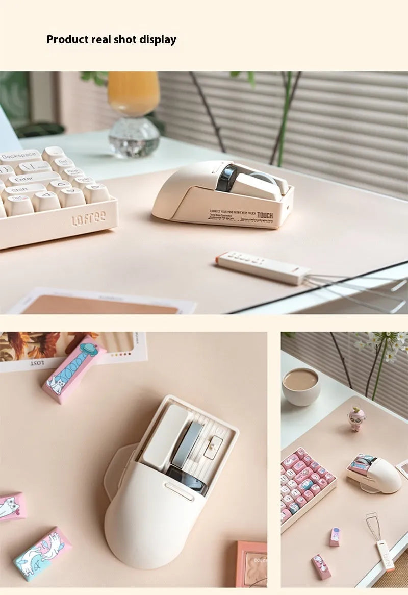 Xiaoqiao Tofu coloured three-mode wireless mouse with ergonomic shape on a desk.
