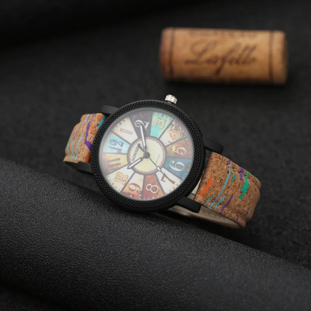 Women's vintage style leather strap quartz watch with 37mm round dial and stainless steel buckle