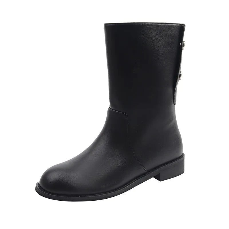 Women's black leather mid-calf platform boots with silver stud details on a white background