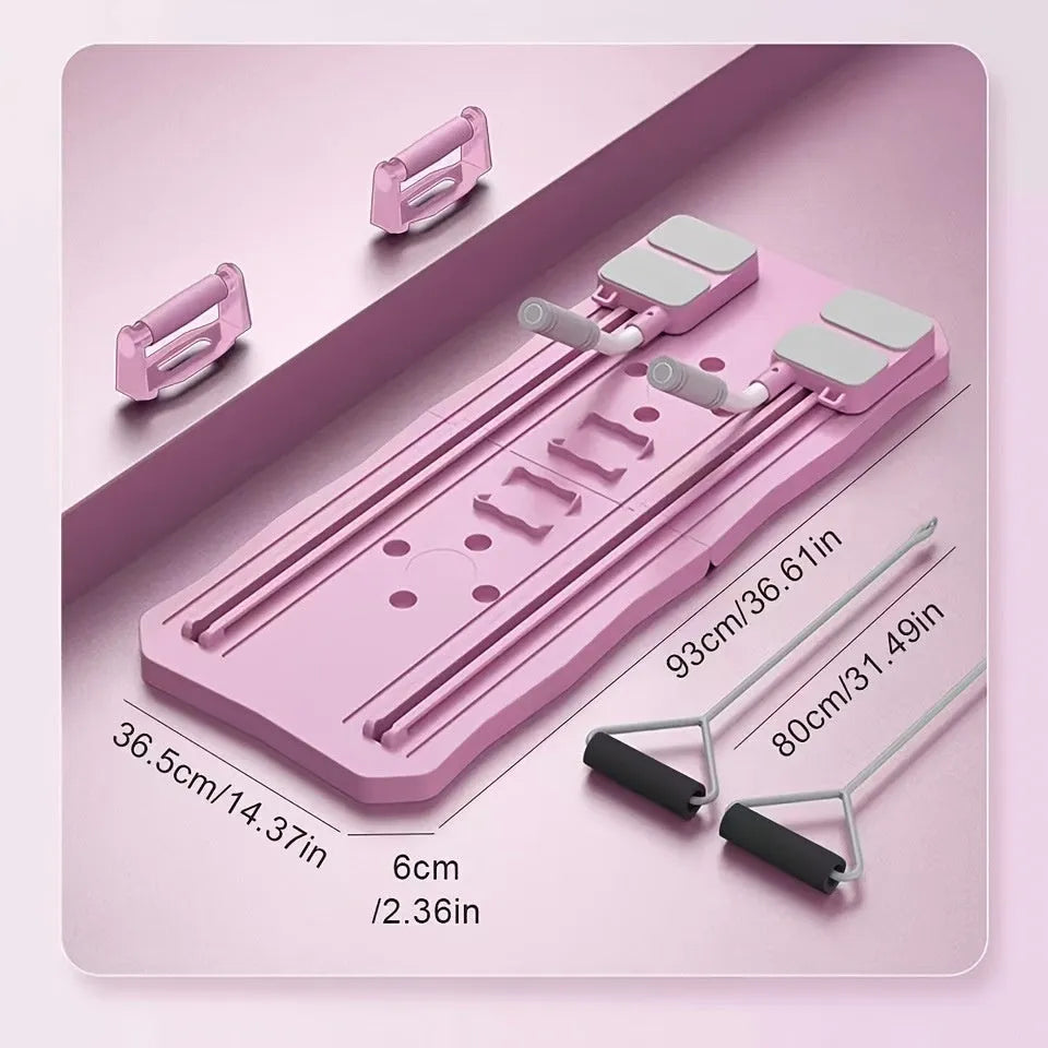 Blue and pink multifunctional ABS supine board with wheel for home ab exercises.
