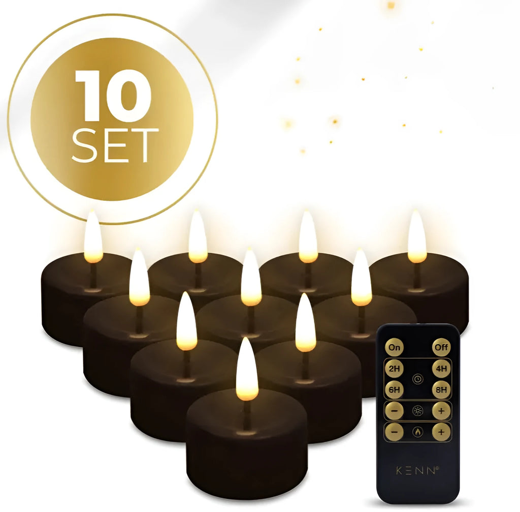 Four black S10 LED flameless tealight candles showing realistic flickering light.