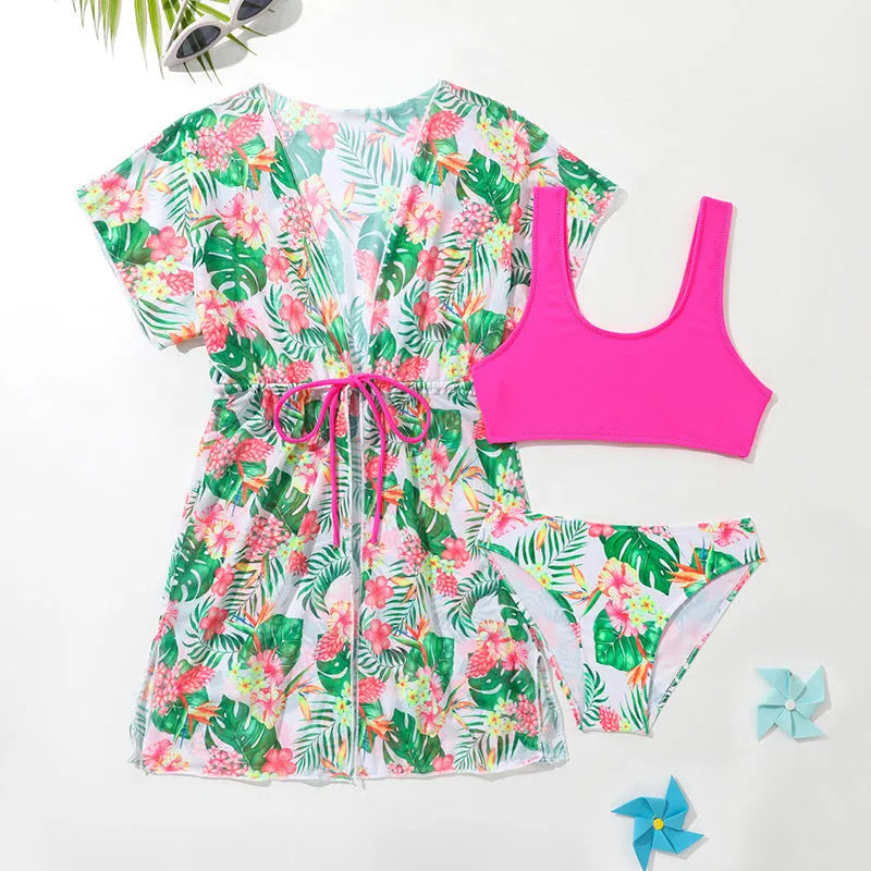Girls' floral two-piece swimsuit in polyester on a white background, showing briefs style.