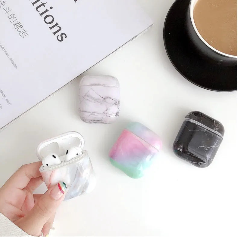White marble-pattern hard PC protective case for Apple AirPods 1 and 2 charging box.