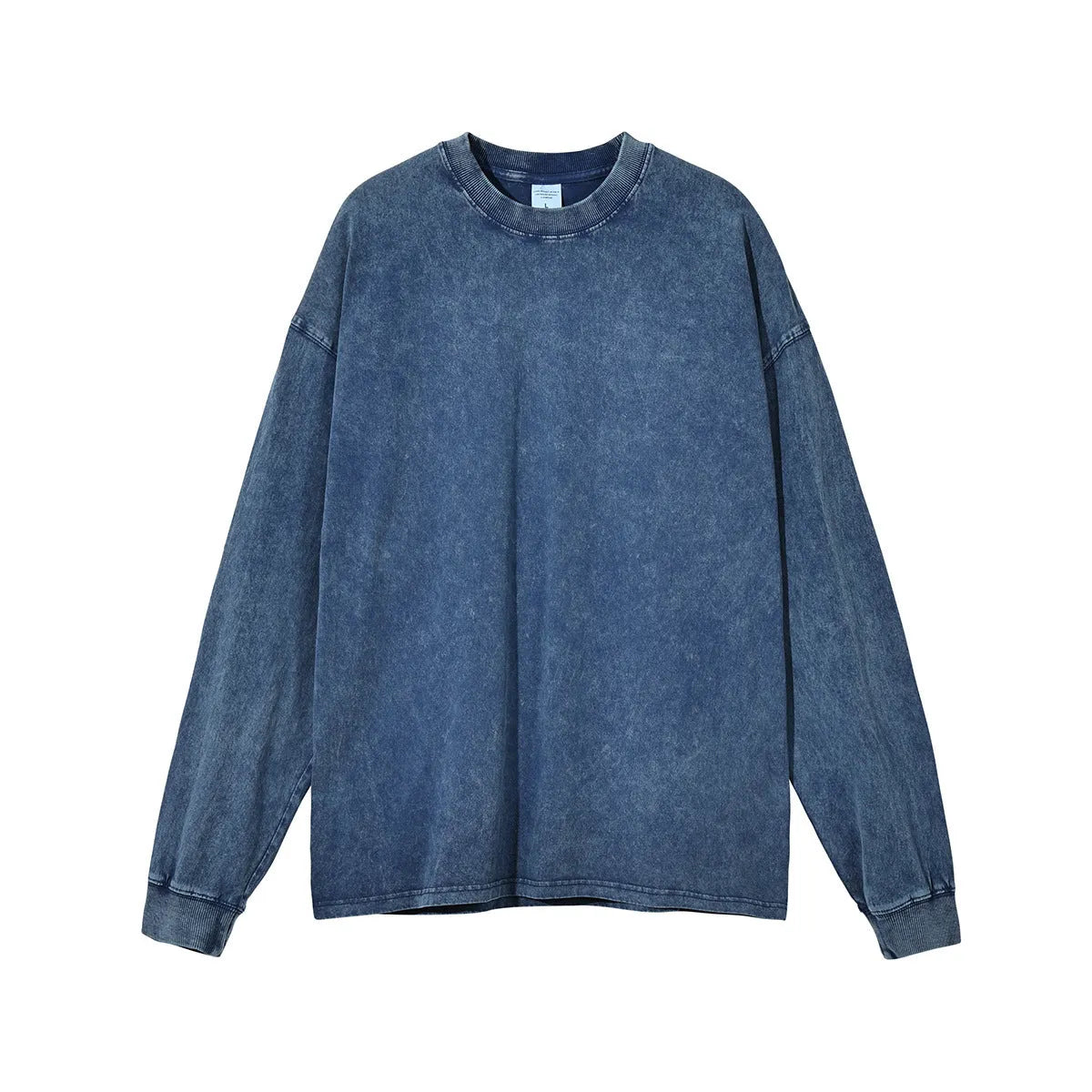 Washed vintage men's cotton long sleeve pullover in batik pattern showing loose fit design