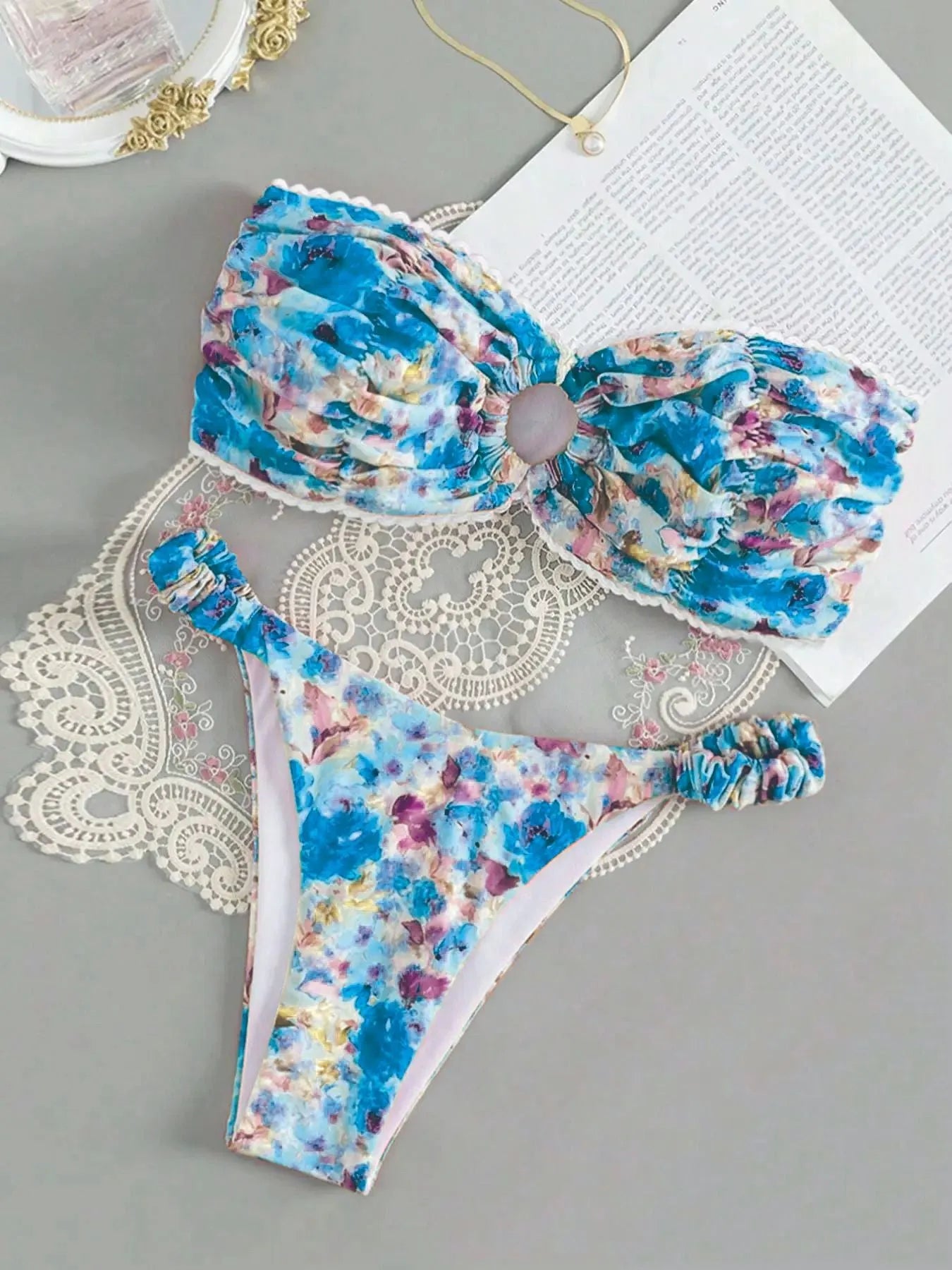 Women's floral print lace detail tube top bikini with matching shorts in blue, yellow, pink, or multi-colour.