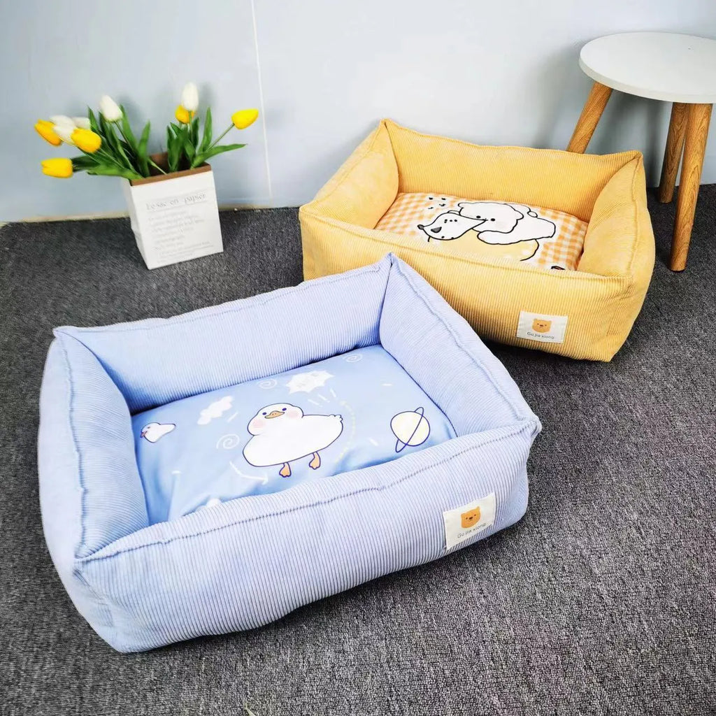 Light blue pet nest for dogs and cats on a wooden floor, showing its plush fabric and padded sides.