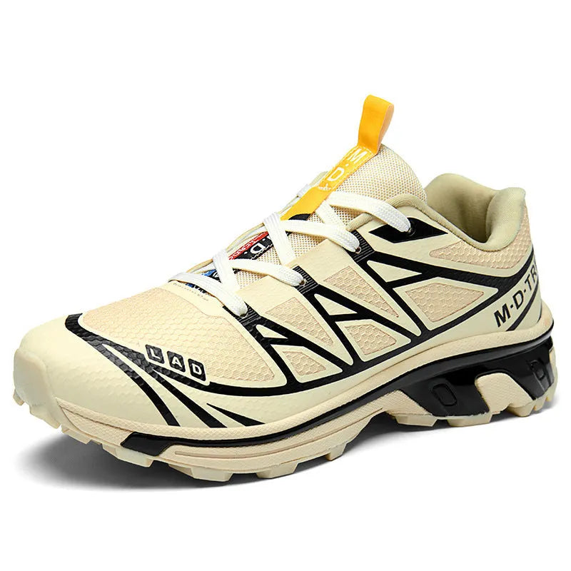 Low-top hiking shoes in artificial leather with mesh lining and a flat rubber sole.
