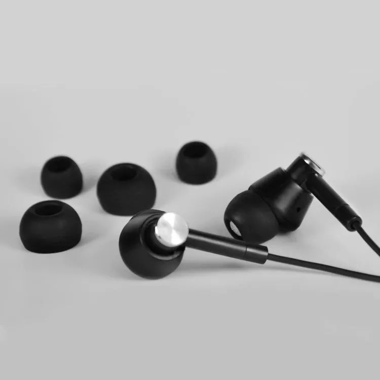 Black and white in-ear earphones headset with subwoofer for computer and mobile phone