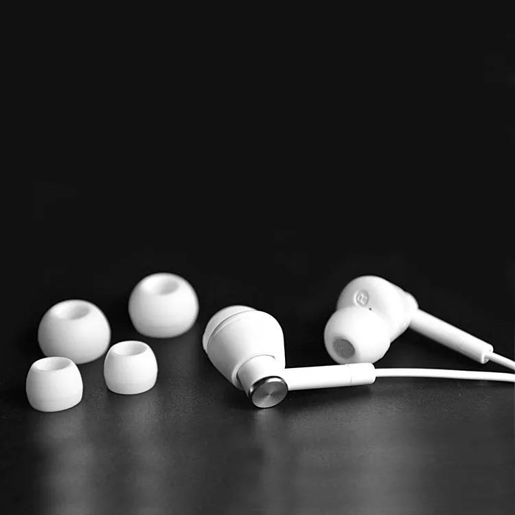Black and white in-ear earphones headset with subwoofer for computer and mobile phone