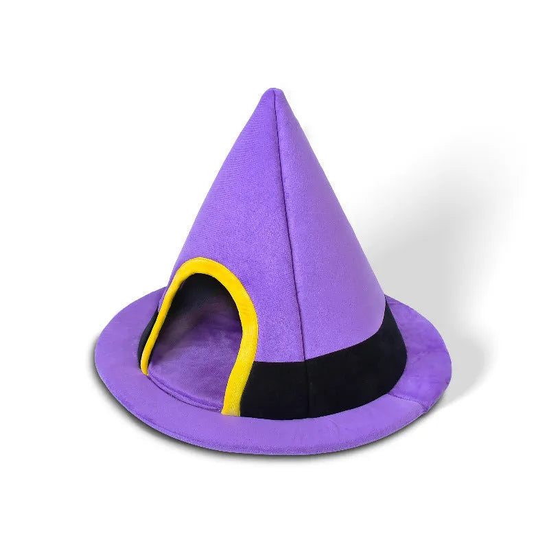 Purple Halloween witch hat shaped cat bed for pets, showing soft cloth material and enclosed design.