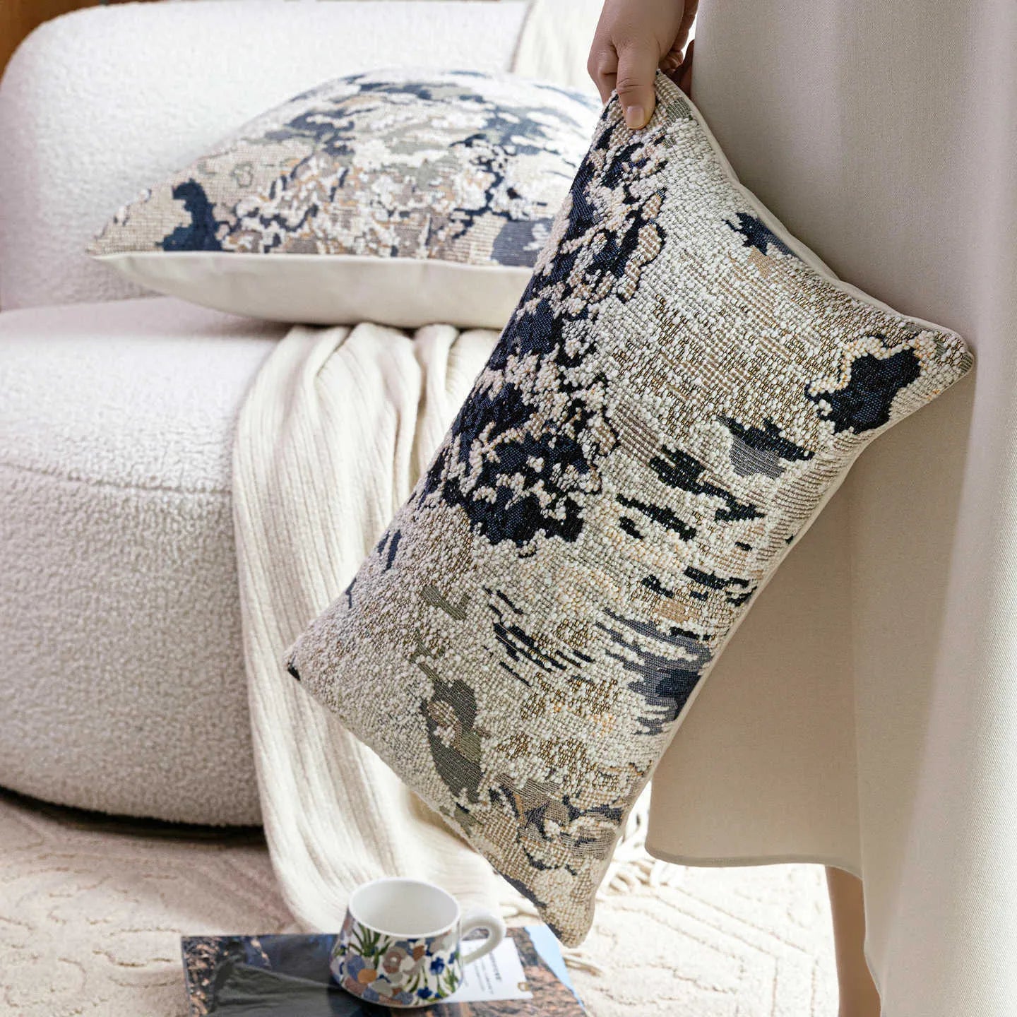 Antique blue decorative cushion with abstract flower pattern in Chinese style, shown in square and waist pillow sizes.