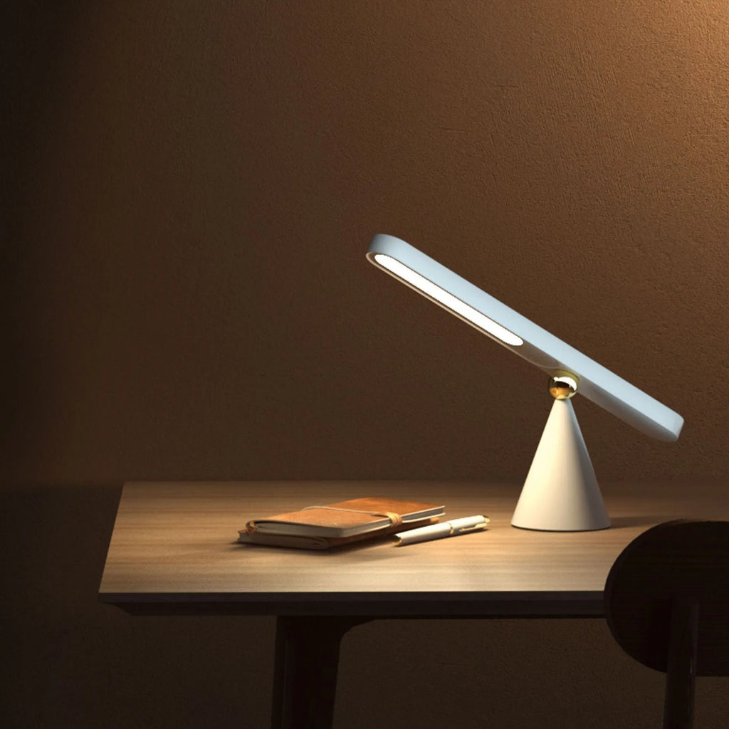 Creative geometric desk lamp in white with magnetic suction base and touch switch, USB powered