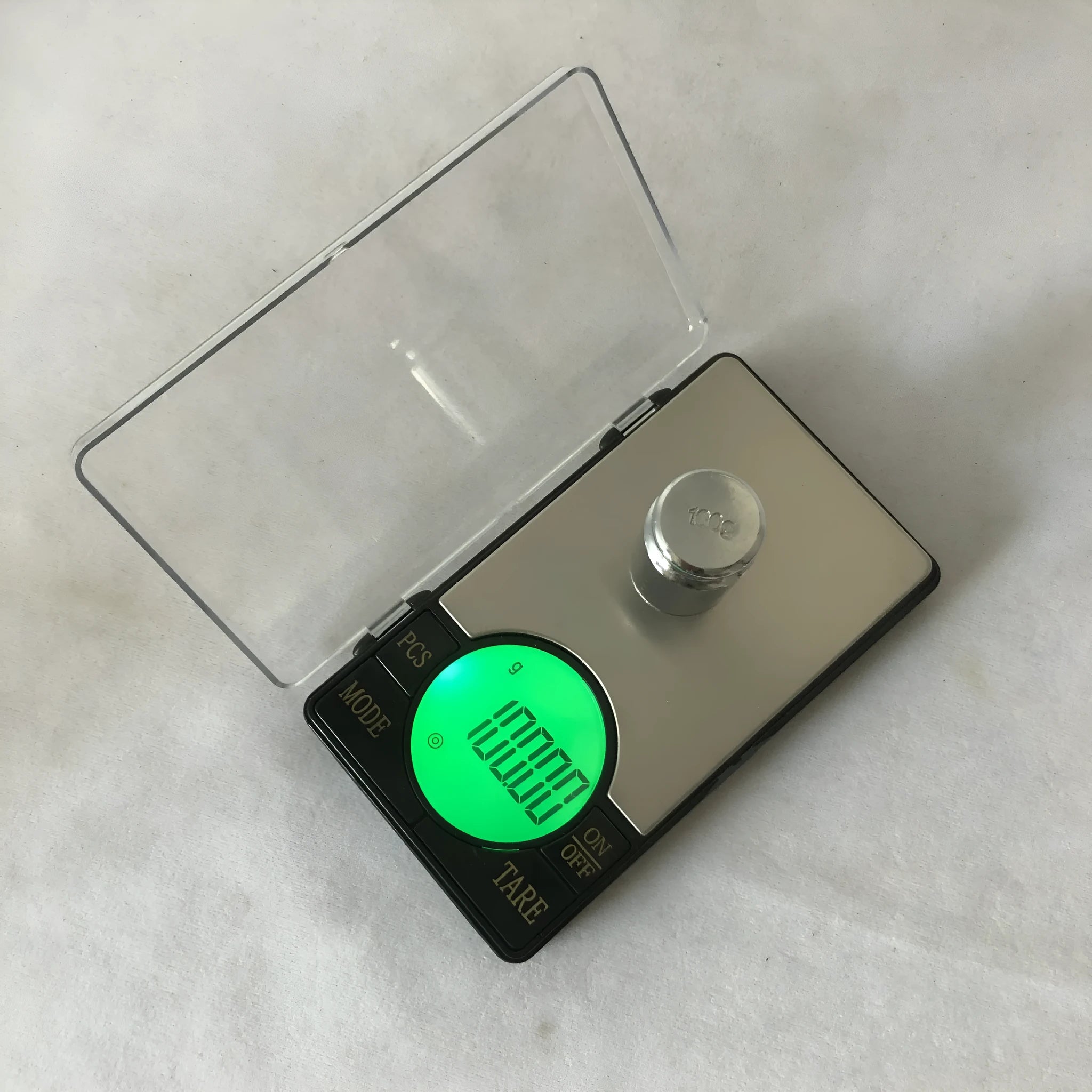 Electronic scale disc display showing gram weight, available in 200g 0.01 precision