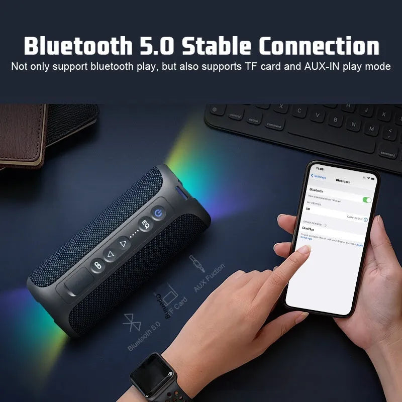 Black and blue fabric-covered 40W wireless Bluetooth speaker with luminous lighting effect.