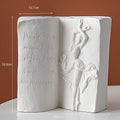 Glazed ceramic book stand in a choice of four decorative colour designs on a desktop.