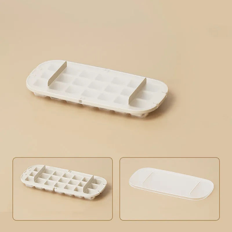 Yellow high-capacity grid ice cube tray with integrated storage slot for an ice shovel