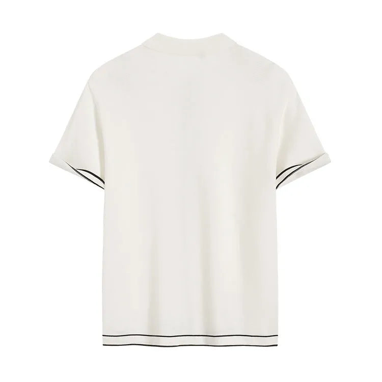 White short-sleeve cardigan with dark contrast colour lapels, buttoned front, and a relaxed fit.
