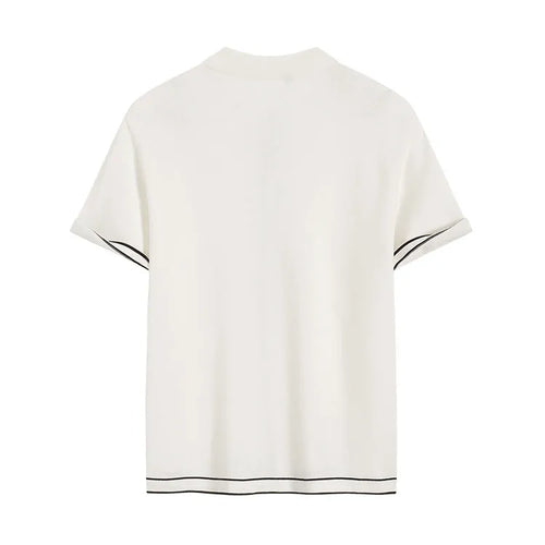 White short-sleeve cardigan with dark contrast colour lapels, buttoned front, and a relaxed fit.