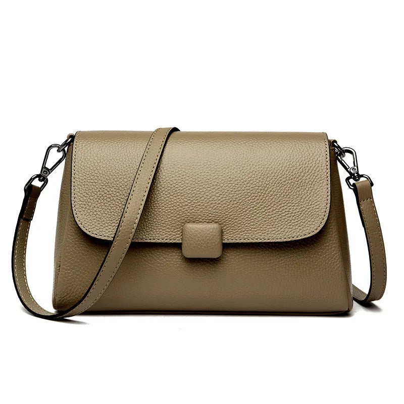 Genuine first-layer cowhide leather shoulder bag in horizontal square shape, 26x16x9cm, black colour, with top zipper and sandwich pocket
