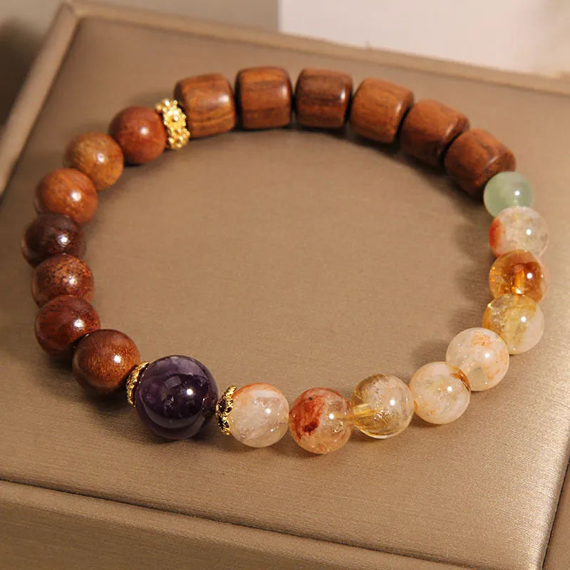 Yellow tower crystal and ebony amethyst women's bracelet with rhinestone details.