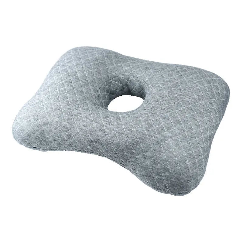 Beauty salon single hole ear pillow with detachable cover in Boer Gray colour, shown on a treatment bed.