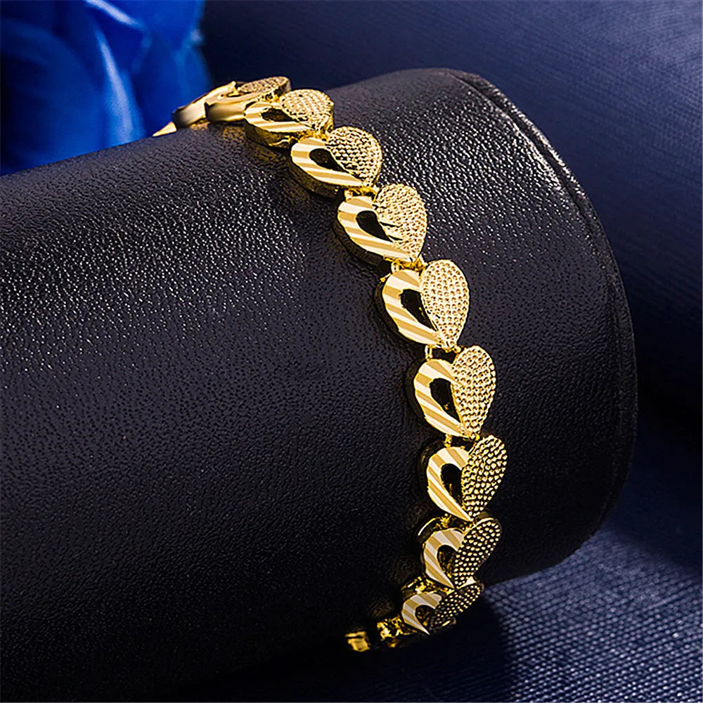 Gold-plated copper heart-shaped bracelet for women, 18.5cm length, electroplated non-inlaid design