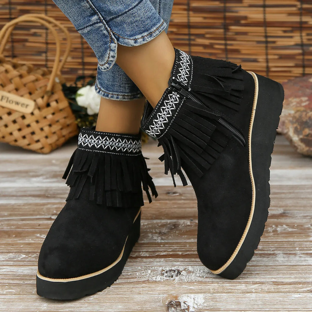 Women's black suede wedge ankle boots with side zipper and tassel detail