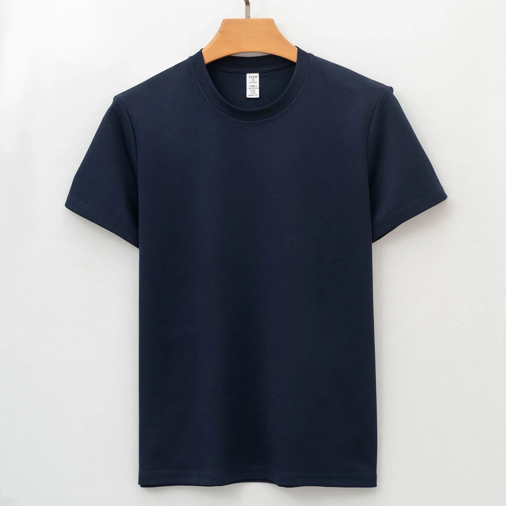 Men's solid colour antibacterial quick-dry short sleeve t-shirt on a hanger, straight cut style.