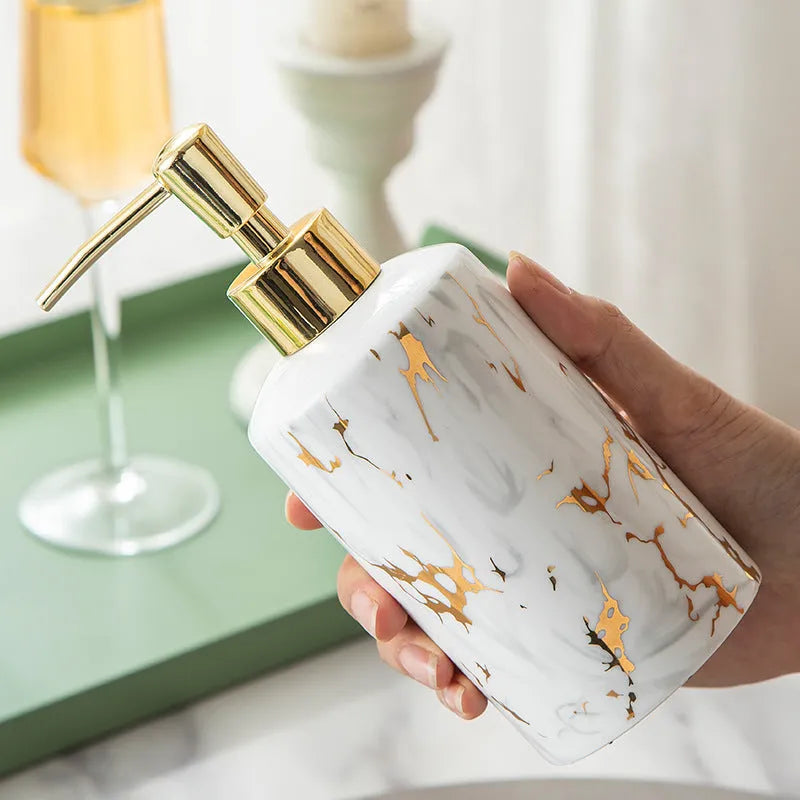 White ceramic bathroom wash set with soap dish, drinking cups, and liquid dispenser in colour gift box