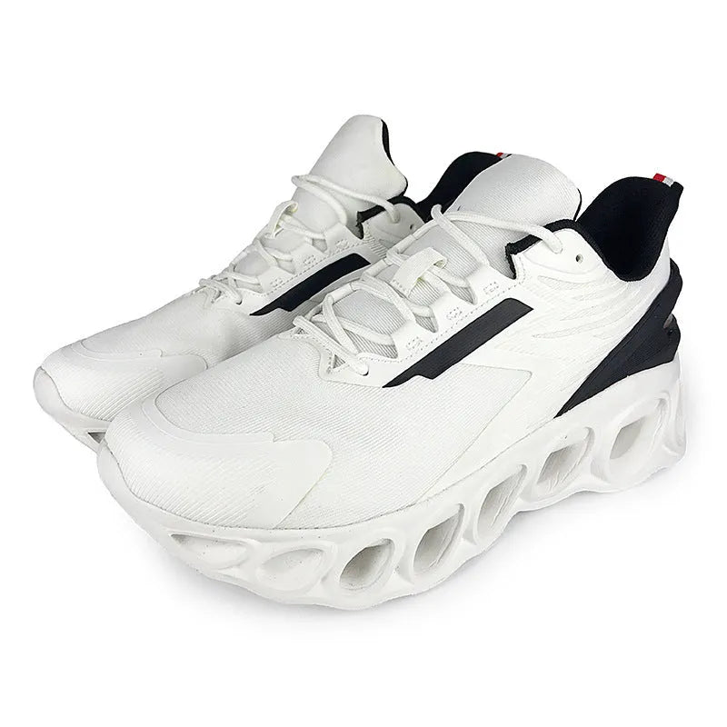 Breathable low-top lace-up casual trainers in black, white, and dark blue colours on a white background.