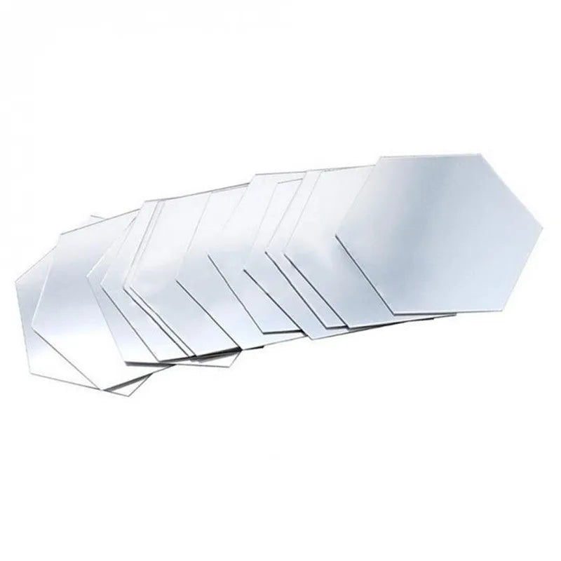 Hexagonal silver PS mirror wall sticker on a wall surface close up